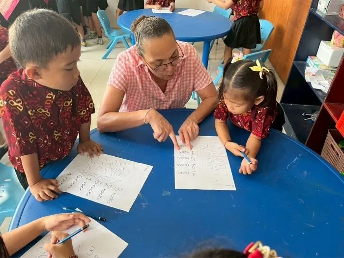 Family taking part in a volunteer vacation in Asia with coastal conservation activities and private accommodation style travel