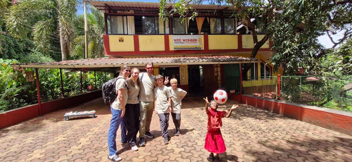 volunteer-abroad Family volunteering together during a volunteer vacation in Asia